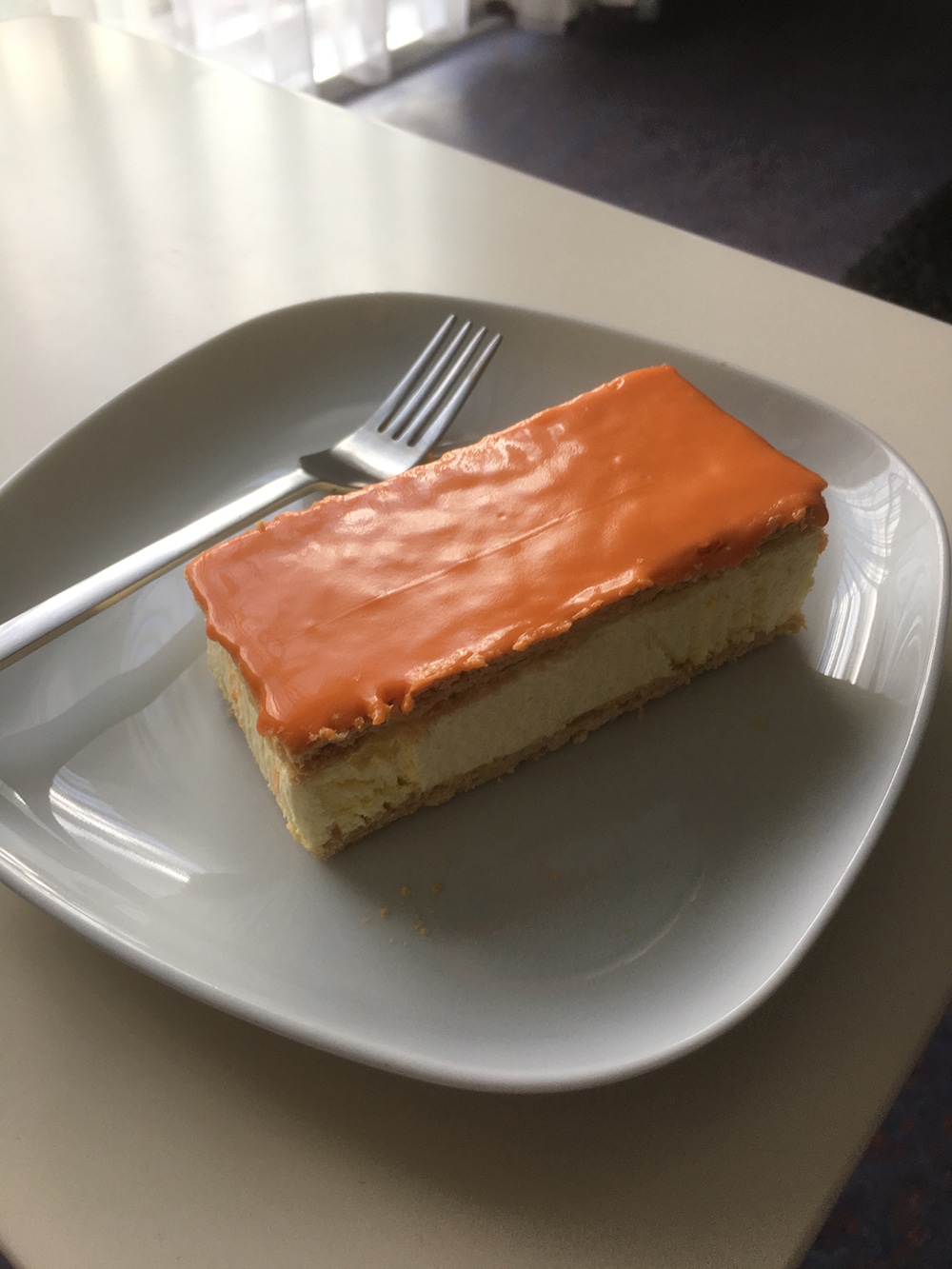 An orange tompouce, a typical Kings Day treat in The Netherlands